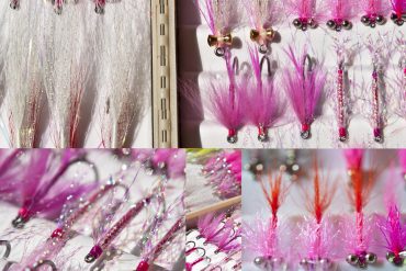 A well stocked pink fly box. Via www.aarongoodisphotography.com
