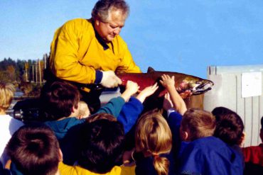 Kids checking out the Coho salmon