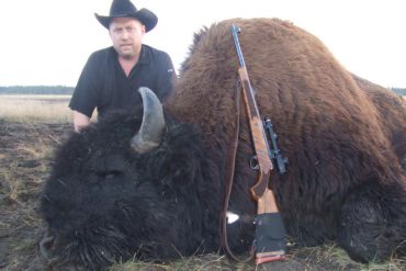 Matt Siemens with his bison kill in 2012