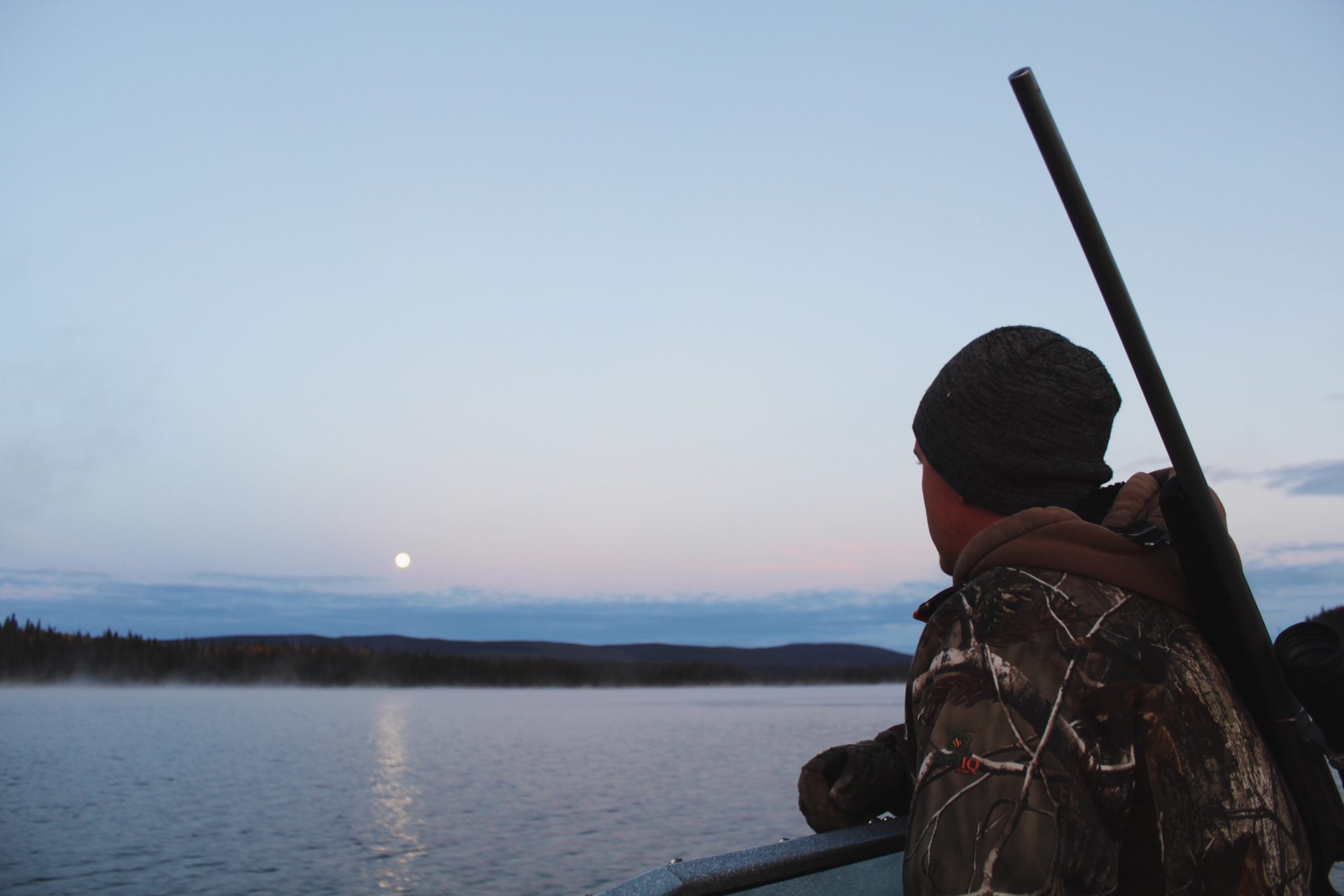 Up with the moon, crossing Ootsa Lake in the pursuit of moose.