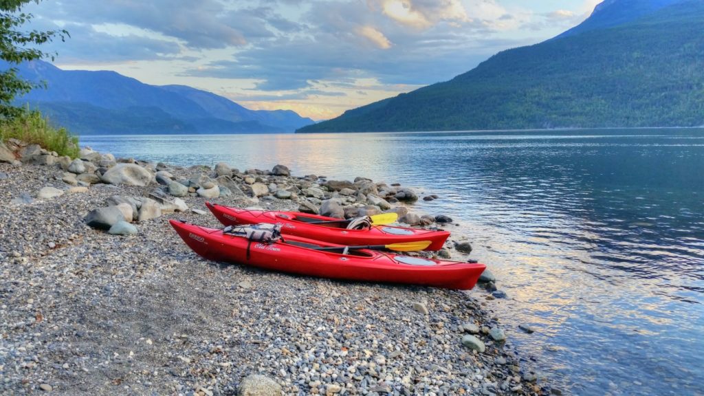 Kayaks stand at the ready on Slocan Lake.