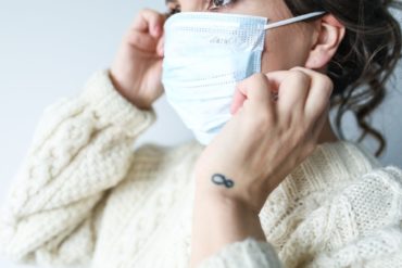 Woman wearing face mask.