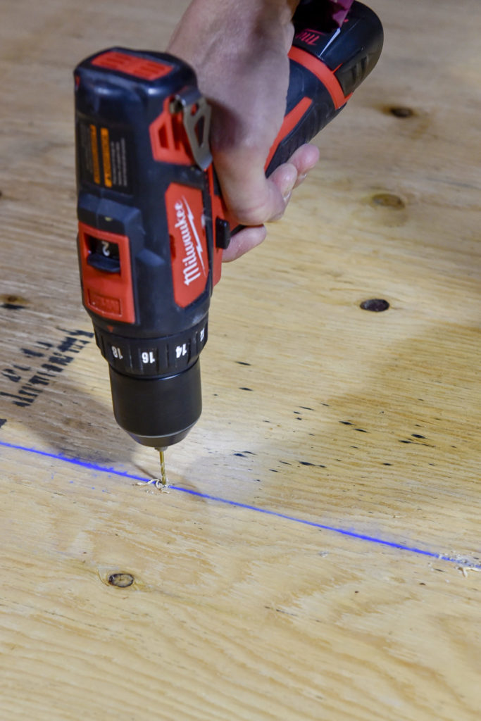 4.	Screw holes were marked and pre-drilled to prevent splitting the wood. 