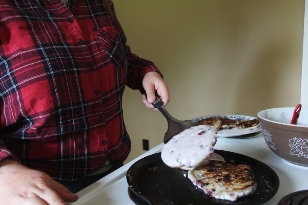 Grilling pancakes. Credit: Raeanne O’Meara.
