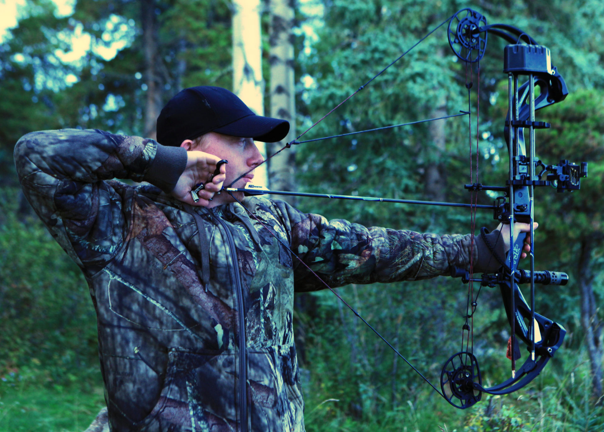 Man bow hunting