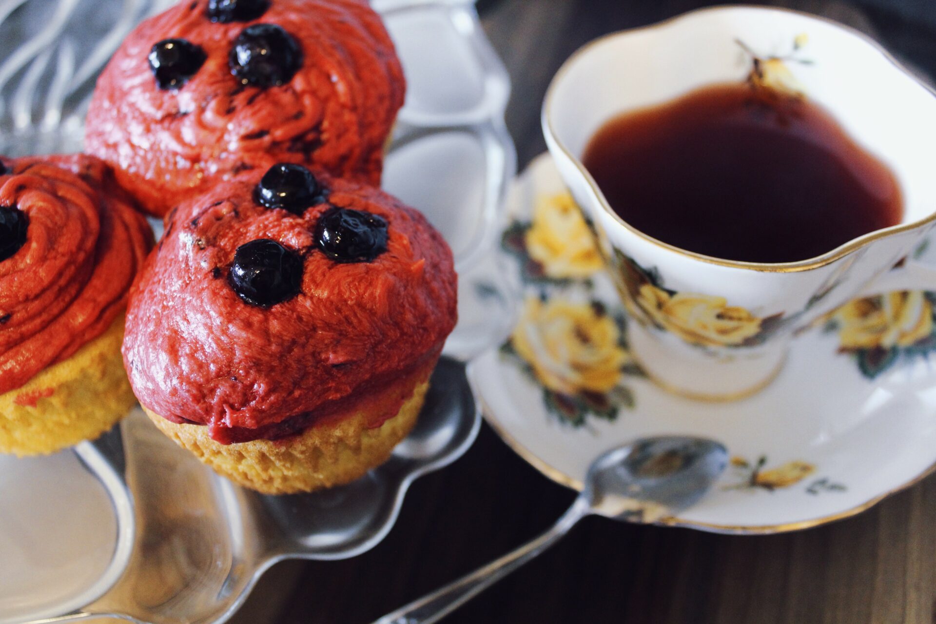 Vanilla Cupcakes With Huckleberry Icing by Raeanne O’Meara.