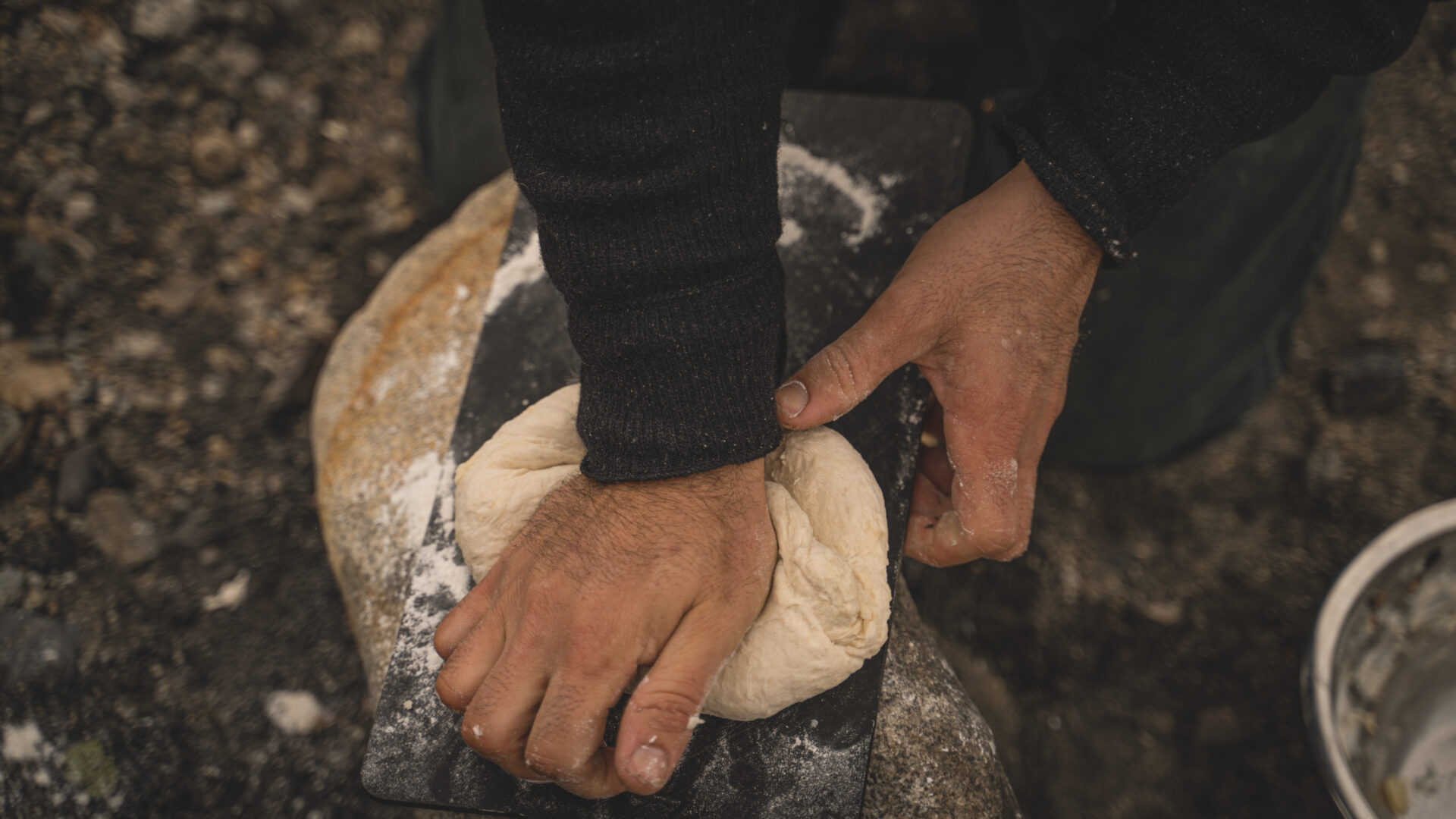 Fireside focaccia bread is no easy task, but the results are worth it. Photo by Cody Preston @codywpreston.