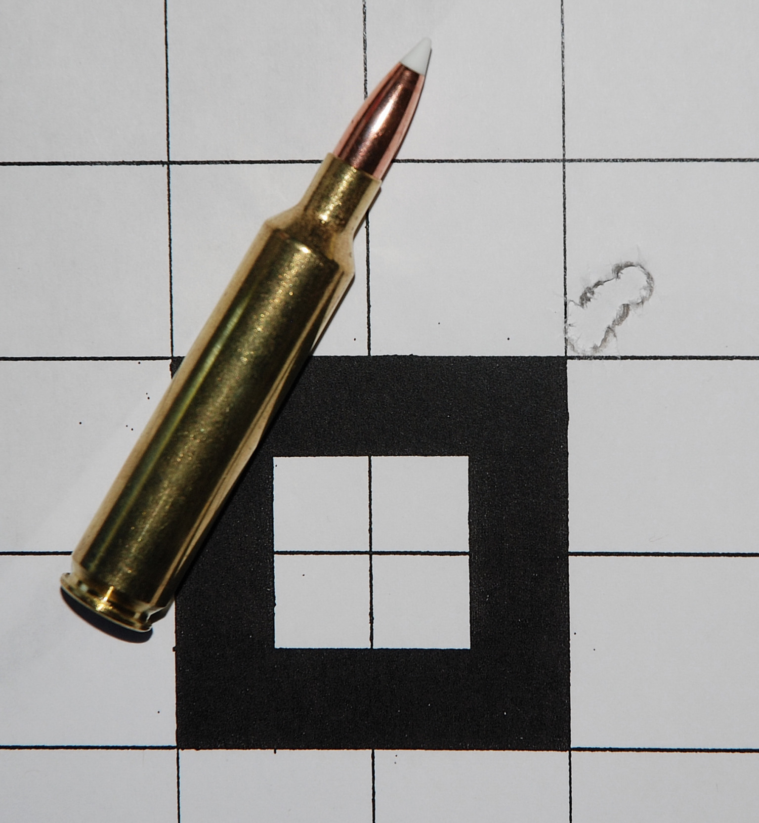 Nosler 150-grain AccuBond bullets and H1000 powder provided this tight .265-inch, three-shot, 100-yard group.