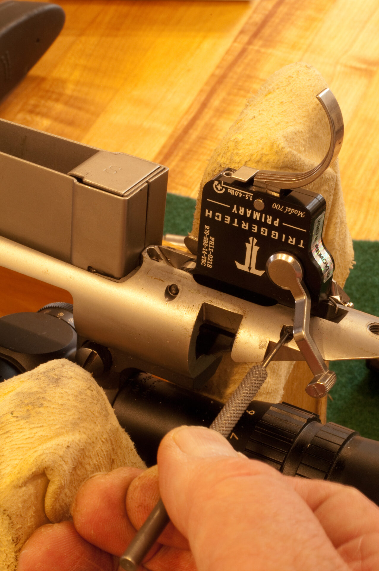 The main tool required to change the trigger is a punch and some patience.