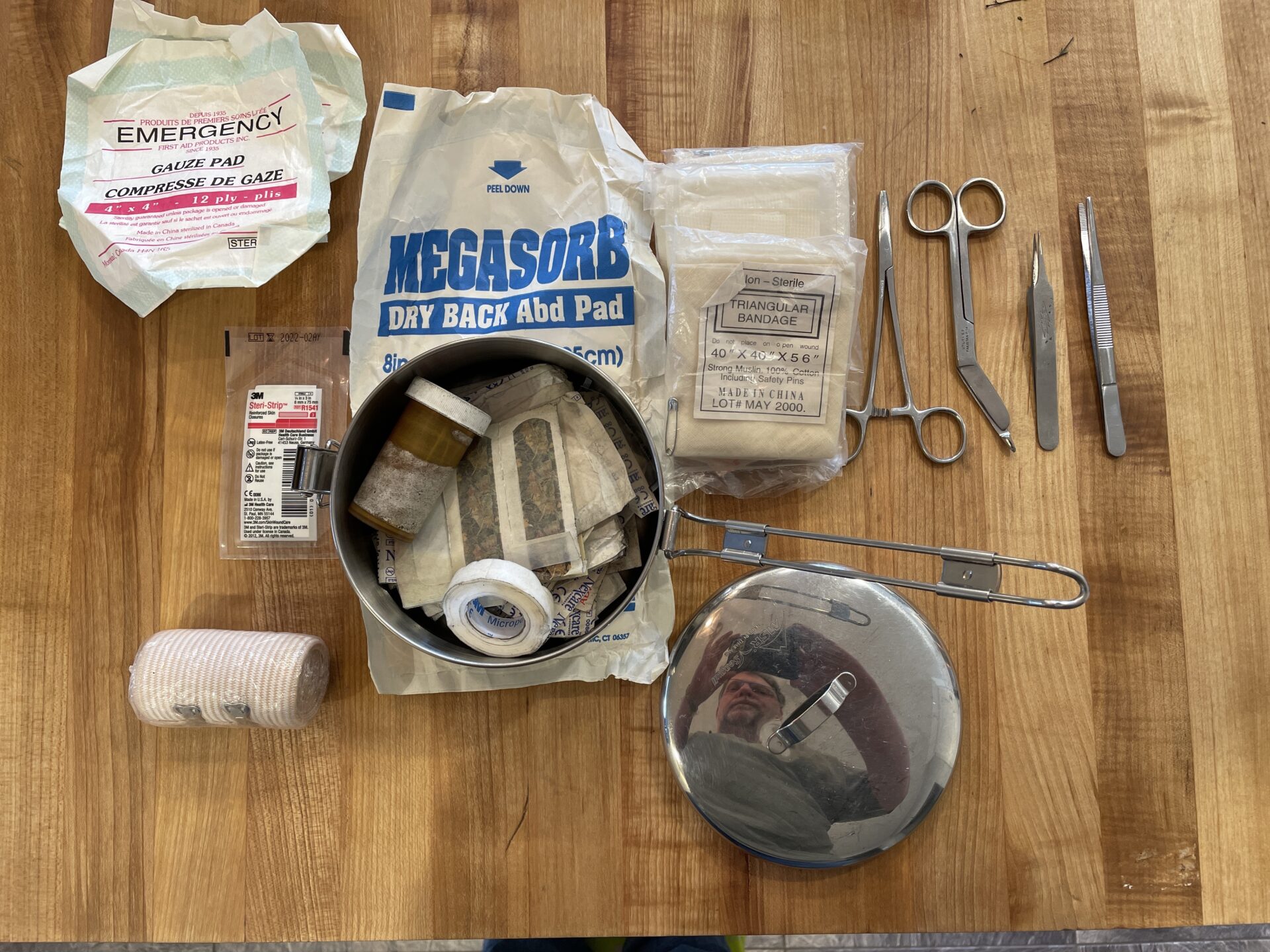 The author’s first aid kit, which conveniently fits into a cooking pot.