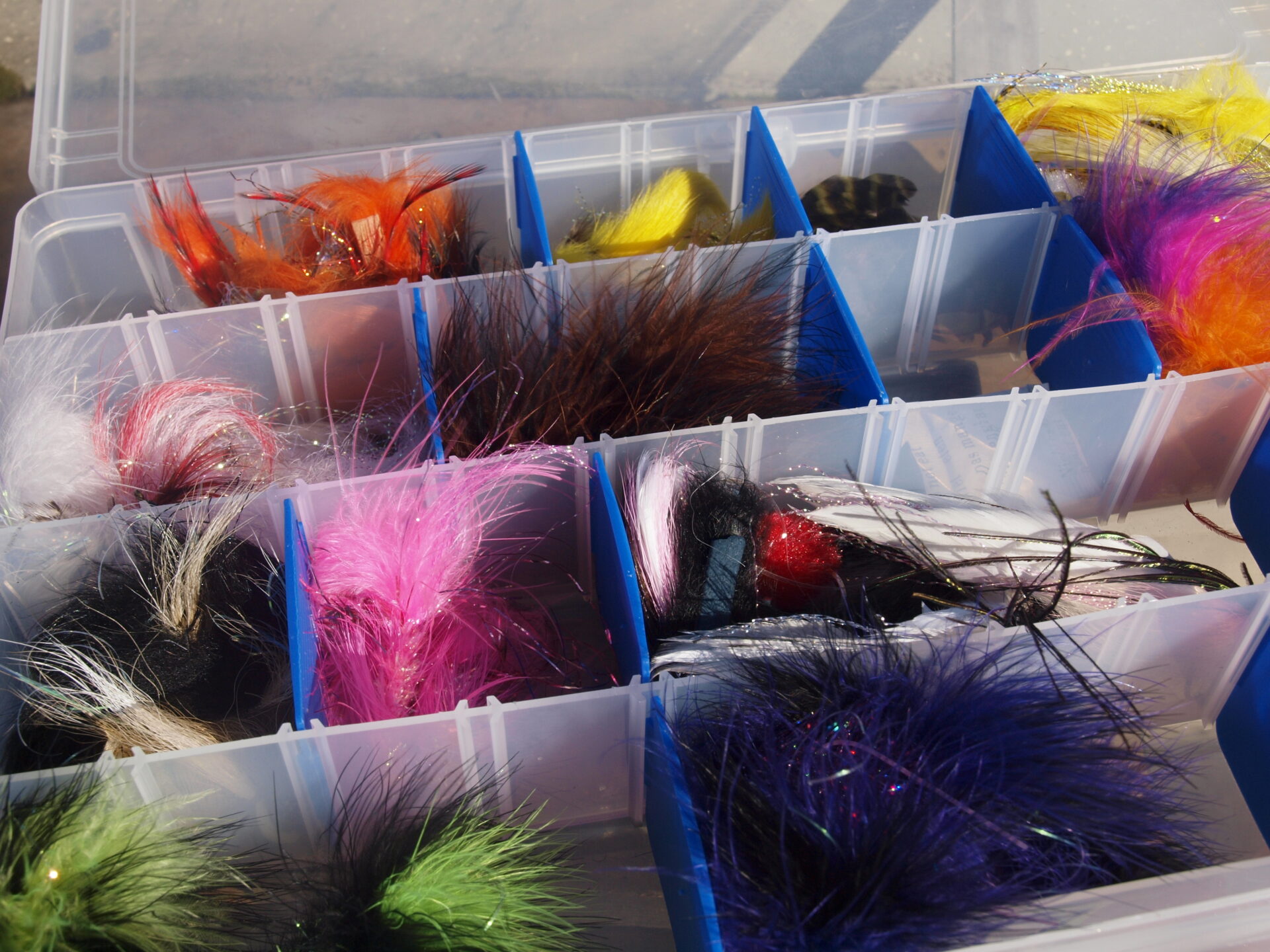 A variety of colourful streamers will take lake trout.