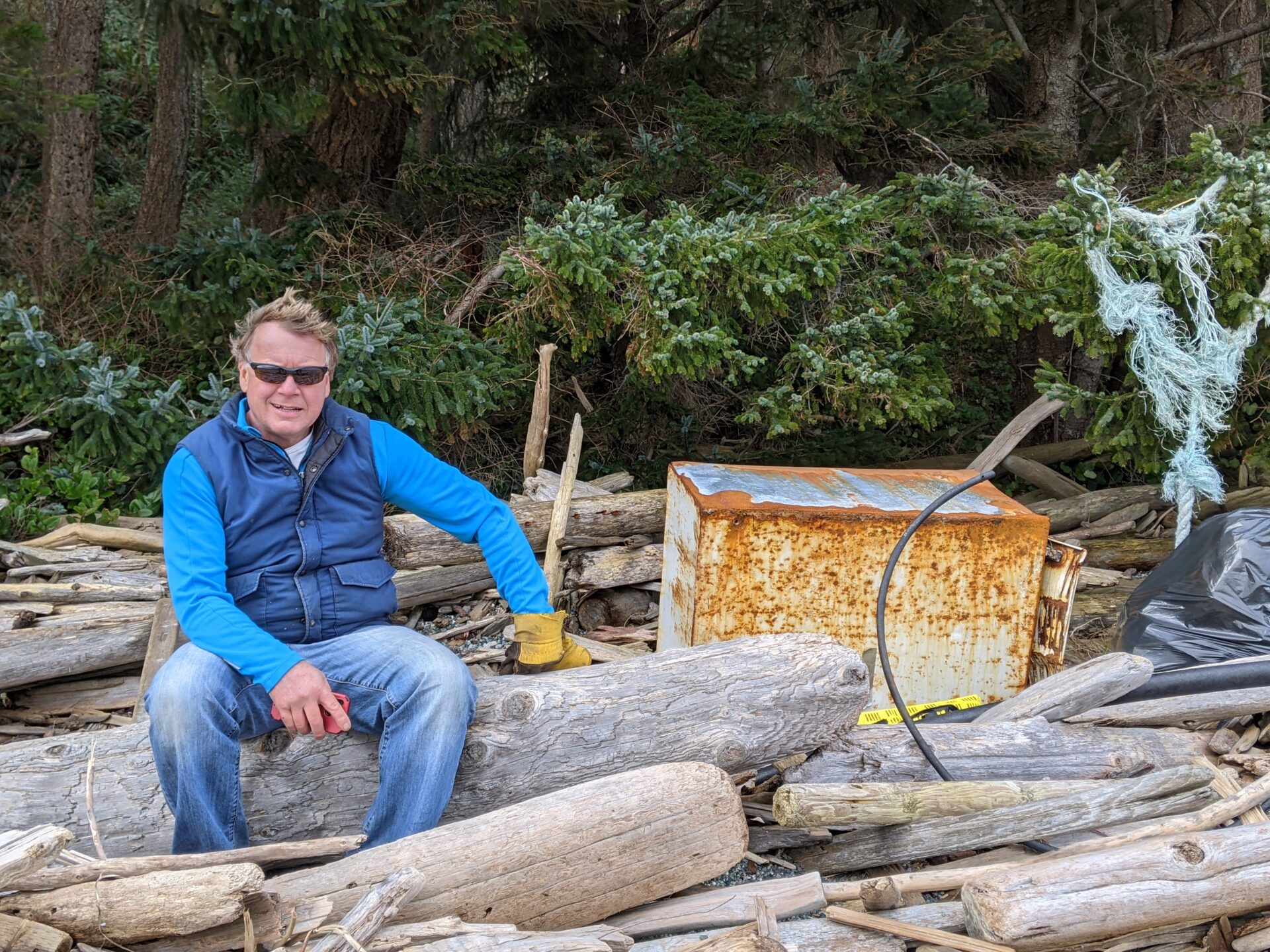 The author, beside a washed-up freezer.