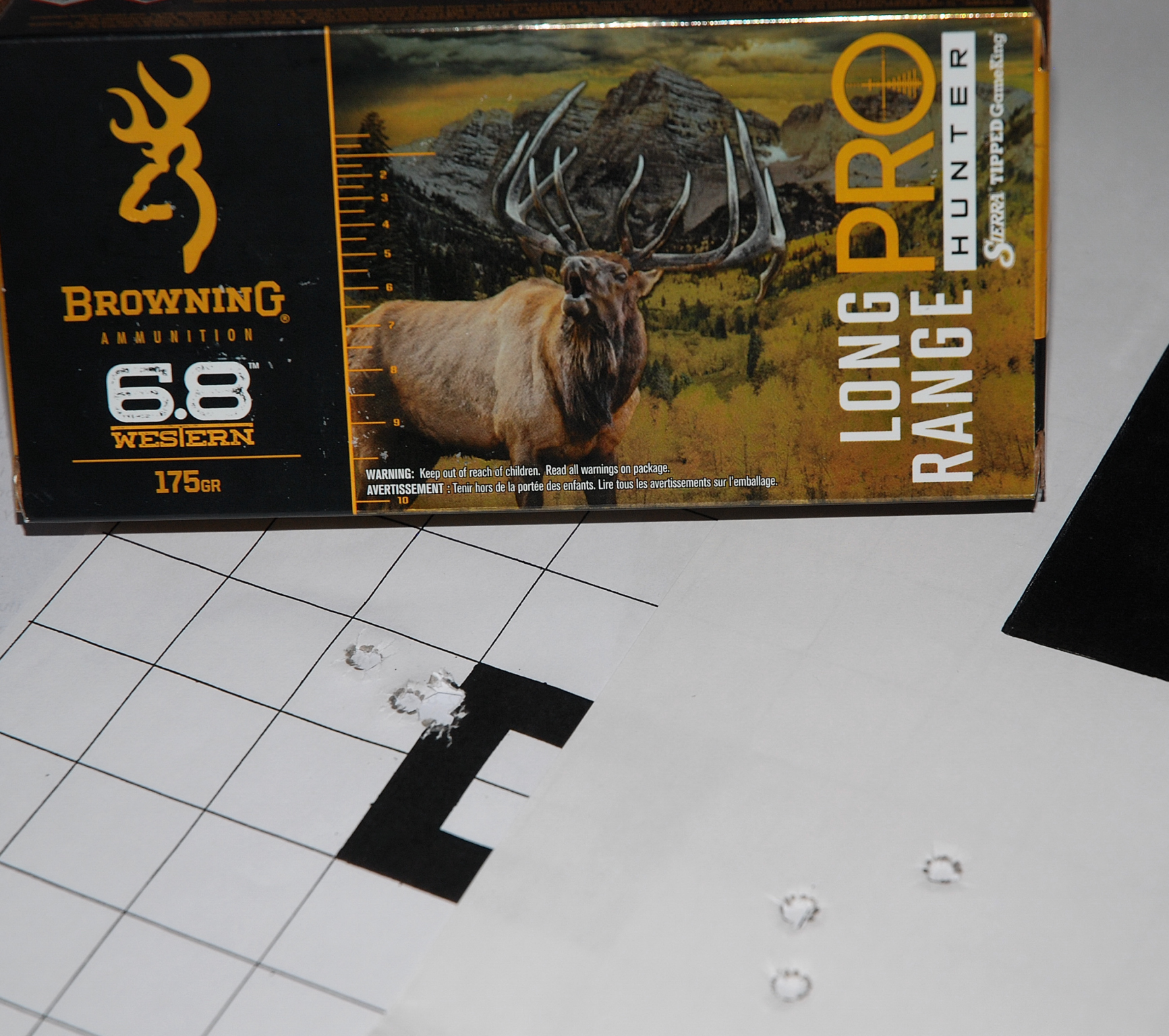 Browning Long Range Pro 175-grain Sierra Tipped GameKing ammunition delivered both of these outstanding .792 inch 100-yard (left target) and 1.408 inch 300-yard (right target) three-shot groups.